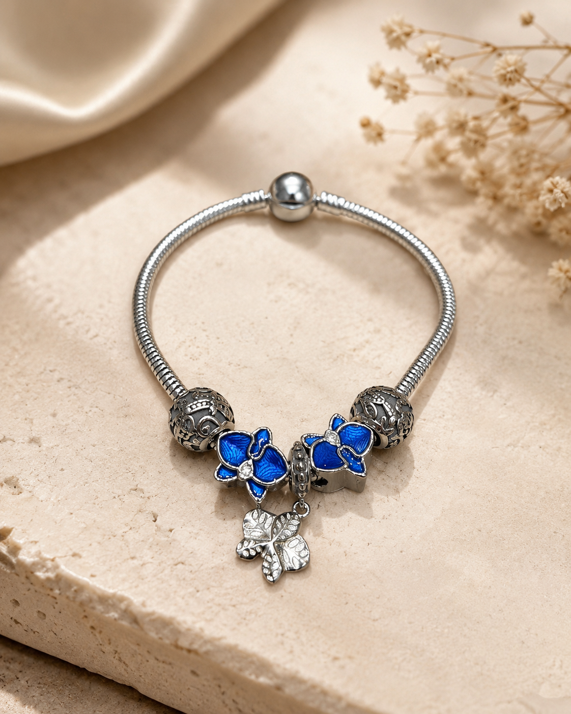 Stainless Bracelet with Blue Floral Charm